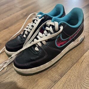 Nike Black and Blue Sneakers with Pink Accents